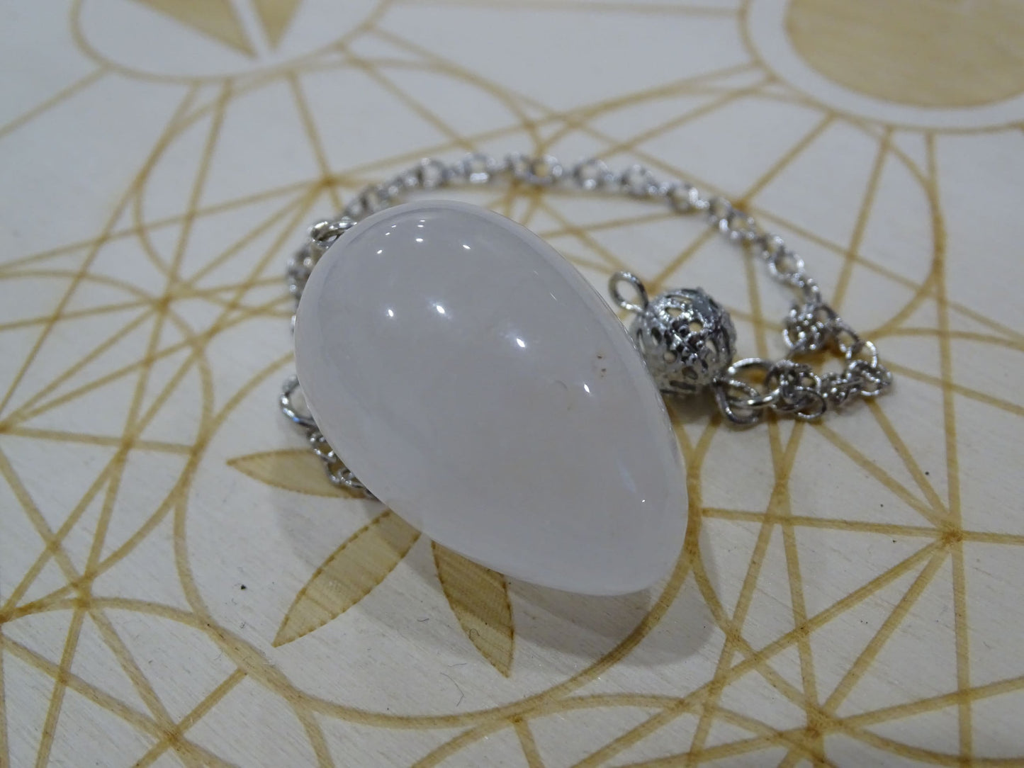 Pendule Quartz Cristal de Roche Oeuf - Cristaux - Colibri Minéraux et Bien-être
